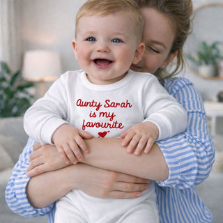 Personalised baby gift – smiling baby wearing custom “Aunty Sarah is my favourite” bodysuit, perfect unique gift for newborn