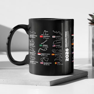 Black ceramic mug with F1 2026 race calendar featuring circuit designs, country flags and race dates