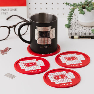 Anfield Stadium red coaster set with Liverpool FC mug on modern desk setup