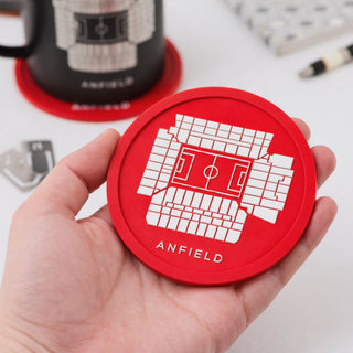Hand holding red Anfield stadium coaster featuring Liverpool FC football gift for men 