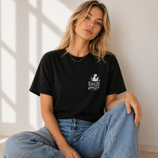 Bookish girl t-shirt with reading graphic of girl sitting on books cute aesthetic tee for book lovers