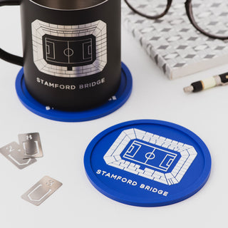 Close-up of a Chelsea FC Stamford Bridge football stadium coaster by Iconic Coasters, showing the detailed stadium design and durable flexible material.