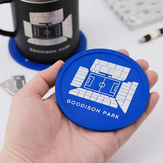 Everton Goodison Park football stadium coaster held in hand, showing flexible blue silicone design by Iconic Coasters, ideal gift for men