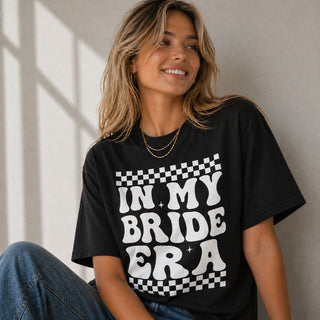 In my bride era black t-shirt with white retro text design bridal party tee for bride to be