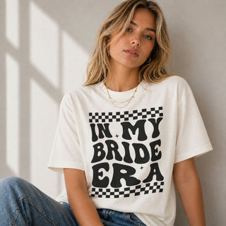 In my bride era ivory t-shirt with black retro text graphic for bride to be and hen party outfit