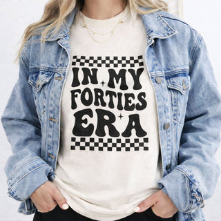 In My Forties Era ivory t-shirt with black print, organic cotton birthday gift tee styled with a denim jacket