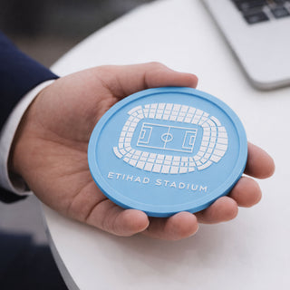 Manchester City Etihad Stadium coaster held in hand, flexible football coaster designed by Iconic Coasters, perfect gift for men