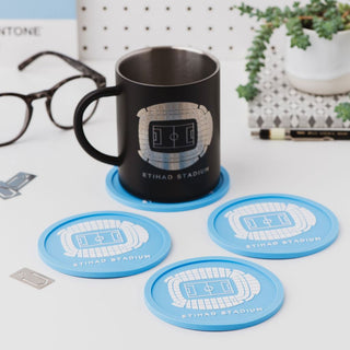 Set of four Manchester City Etihad Stadium coasters by Iconic Coasters, washable flexible football coasters in gift packaging