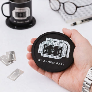 Newcastle United St James’ Park football stadium coaster held in a man’s hand, showing the flexible, long lasting design by Iconic Coasters.