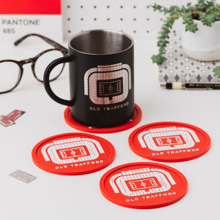 Set of Old Trafford football coasters with mug on desk, stadium themed gift for men