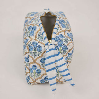 Detailed view of handcrafted organic cotton floral makeup bag