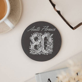 Personalised 80th birthday slate coaster with floral engraved design and custom name elegant gift idea