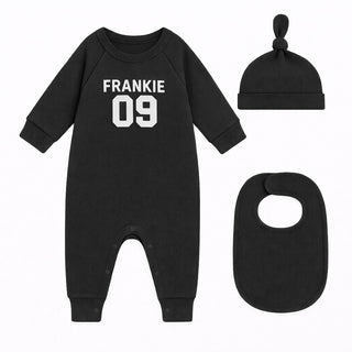 Personalised black football style baby grow with name and number including matching bib and hat for 0 to 3 months baby