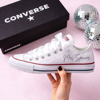 Personalised bride Converse sneakers with Mrs Spencer name on white wedding Converse shoes
