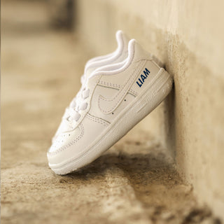 Personalised Nike Force 1 baby crib trainers customised with the name Liam