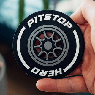 Pitstop Hero white F1 racing wheel drink coaster – Formula 1 themed bar coaster and motorsport desk accessory